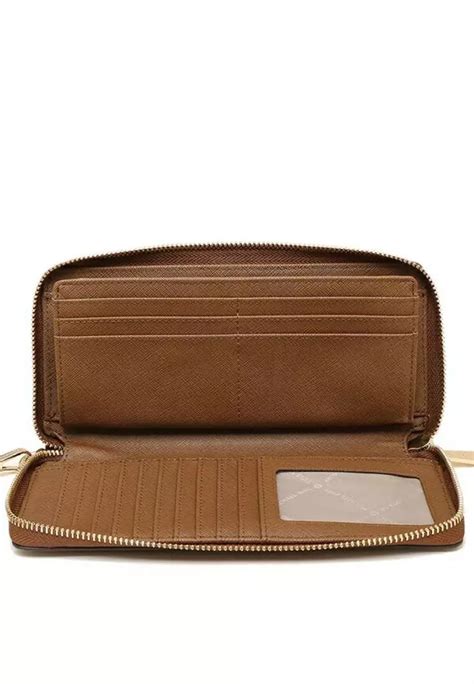 Jet Set Travel Large Pebbled Leather Wristlet.